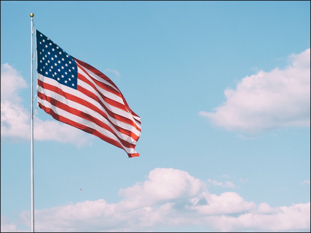 American flag against clear blue sky